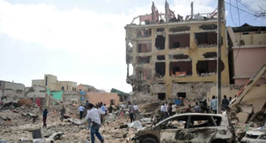 Shabaab militants were driven out of Mogadishu  in 2011 but continue to launch terror attacks inside the Somali capital -- such as this raid on a hotel which killed 28 people in January 2017.  By MOHAMED ABDIWAHAB AFP