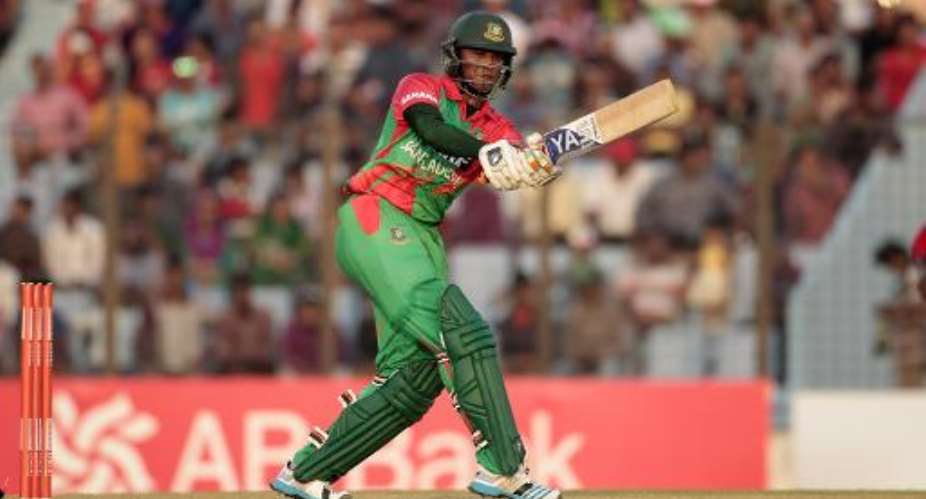 Bangladesh all-rounder Shakib Al Hasan plays a shot during the first one-day international against Zimbabwe at The Zahur Ahmed Chowdhury Stadium in Chittagong on November 21, 2014.  By  AFP