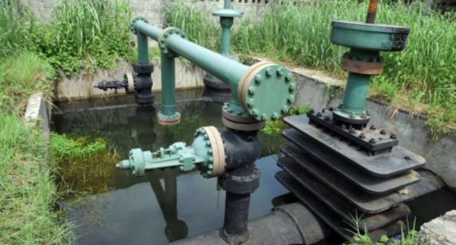 A Shell oil secured inlet manifold in the Niger Delta swamps of Bodo, in Nigerias Rivers State last year.  By Pius Utomi Ekpei (AFP)