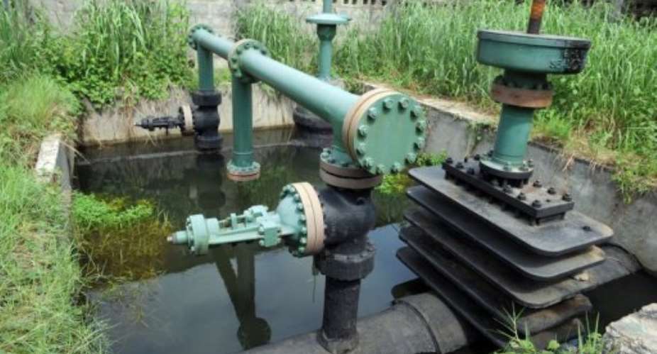 A Shell oil secured inlet manifold is seen in the Niger Delta swamps in 2010.  By Pius Utomi Ekpei AFPFile