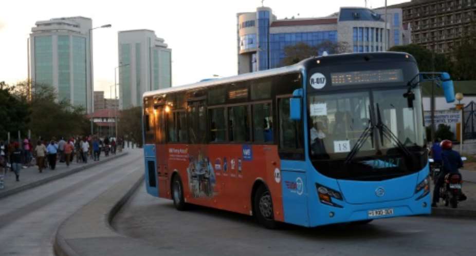 A Dar Rapid Transit DART bus travels down a street in Dar es Salaam.  By Said Khalfan AFPFile