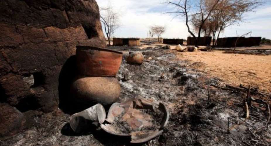 A handout picture from UNAMID shows damage in the village of Sigili in North Darfur on November 6, 2012.  By Albert Gonzalez Farran (UNAMID/AFP/File)
