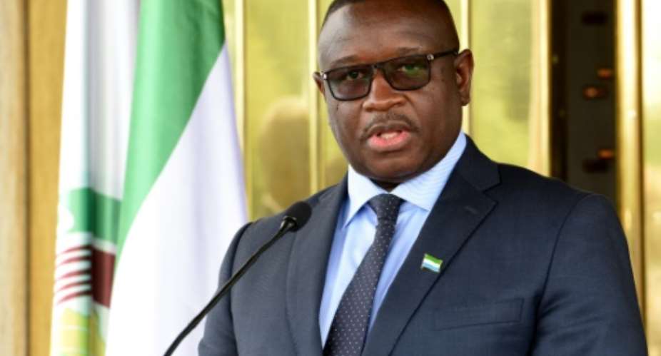Sierra Leone president Julius Maada Bio, pictured in May 2018, marked his 100th day in office by hiking fuel prices, sparking protests in capital city Freetown.  By Sia KAMBOU AFPFile