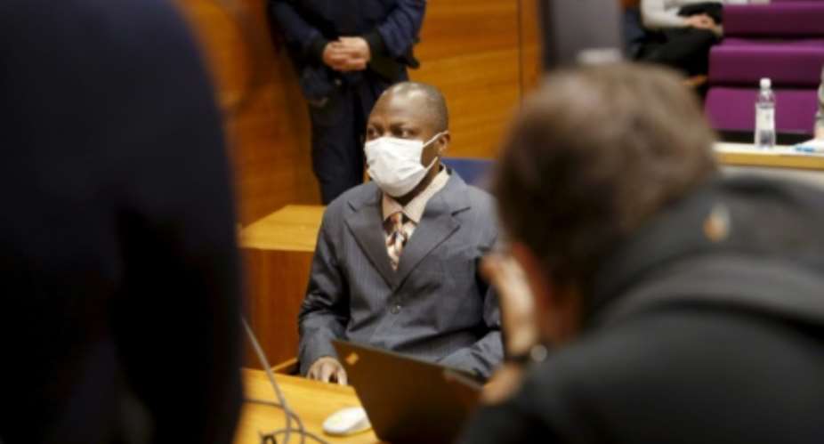 Sierra Leonean national Gibril Massaquoi, seen at the first day of his trial on February 3, risked life in prison in the case of a guilty verdict.  By Kalle Parkkinen (Lehtikuva/AFP/File)