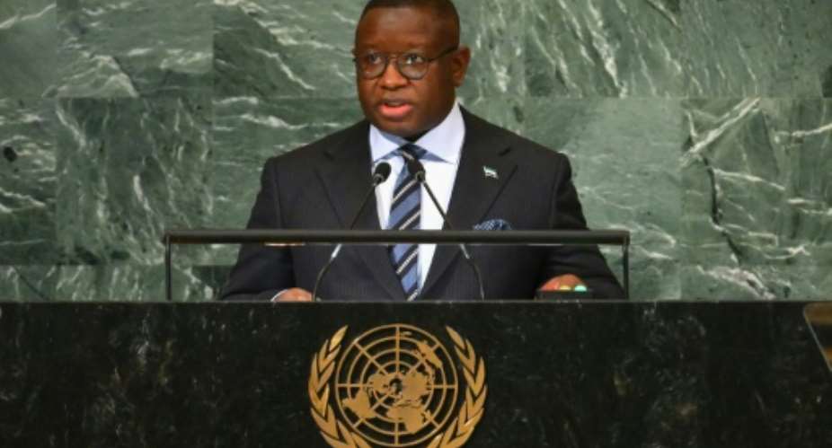 Sierra Leone's President Julius Maada Bio has called for an end to discrimination against women.  By ANGELA WEISS AFPFile