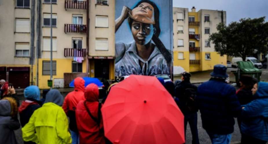 Since the murals went up, a bus line has begun to serve the area, cultural events have multiplied, and the crime rate has fallen.  By PATRICIA DE MELO MOREIRA AFPFile