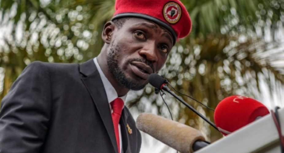 Singer turned politician Robert Kyagulanyi, also known as Bobi Wine, has been charged with annoying the president.  By SUMY SADURNI AFP