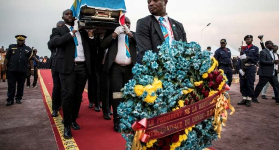 Sixteen months after his death in Belgium, opposition leader Etienne Tshisekedi was buried in his home country, just outside Kinshasa.  By John WESSELS AFP