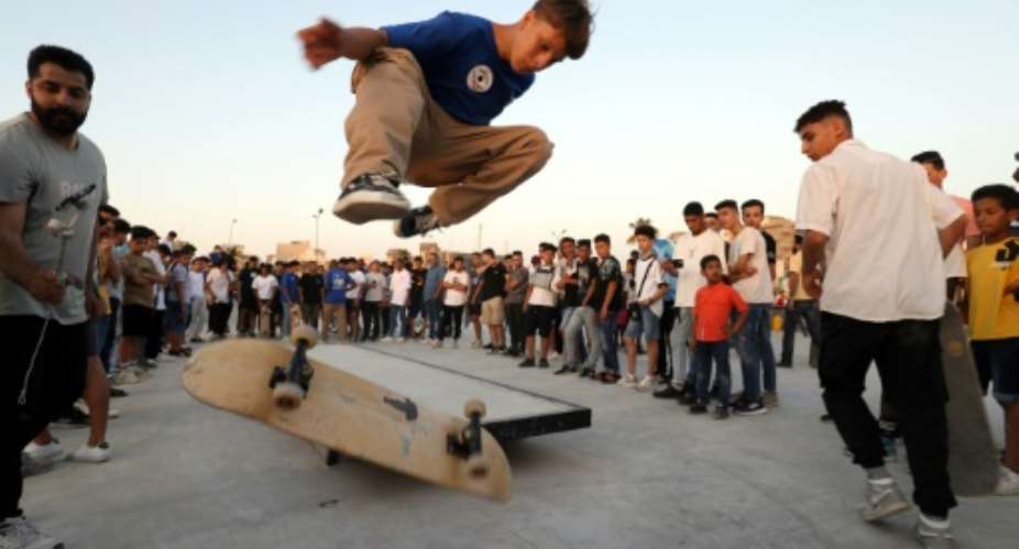 Skateboarders show off their skills during the inauguration of a skatepark, a first in Libya, in the capital Tripoli.  By Mahmud Turkia AFP