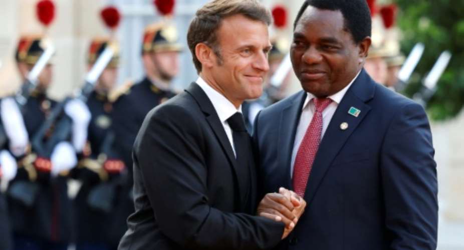 Smiles: Macron and Hichilema at the Elysee palace in Paris on Thursday.  By Ludovic MARIN AFP