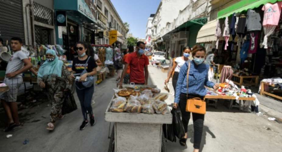 Soaring inflation has eaten away at Tunisians' purchasing power.  By FETHI BELAID AFP