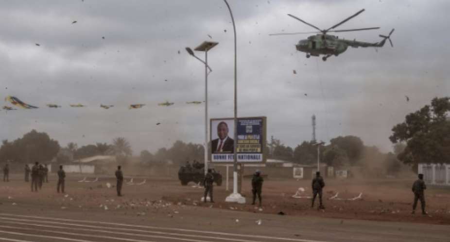 Soldiers in Bangui are pictured during a military parade held to celebrate the 64th anniversary of Central African Republic independence in December 2022.  By Barbara DEBOUT (AFP/File)