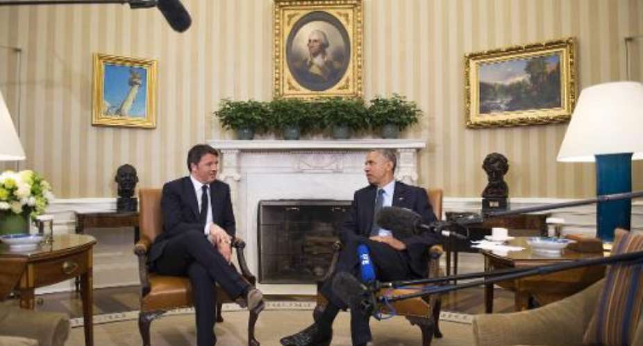 US President Barack Obama R and Italian Prime Minister Matteo Renzi speak in the Oval Office of the White House in Washington, DC, April 17, 2015.  By Jim Watson AFP