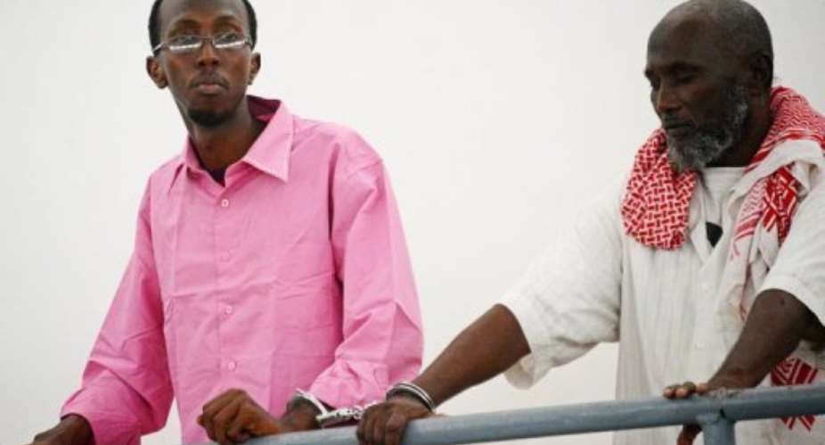 Somali journalist Abdiaziz Abdinuur L is pictured in court in Mogadishu on February 5, 2013.  By Mohamed Abdiwahab AFPFile