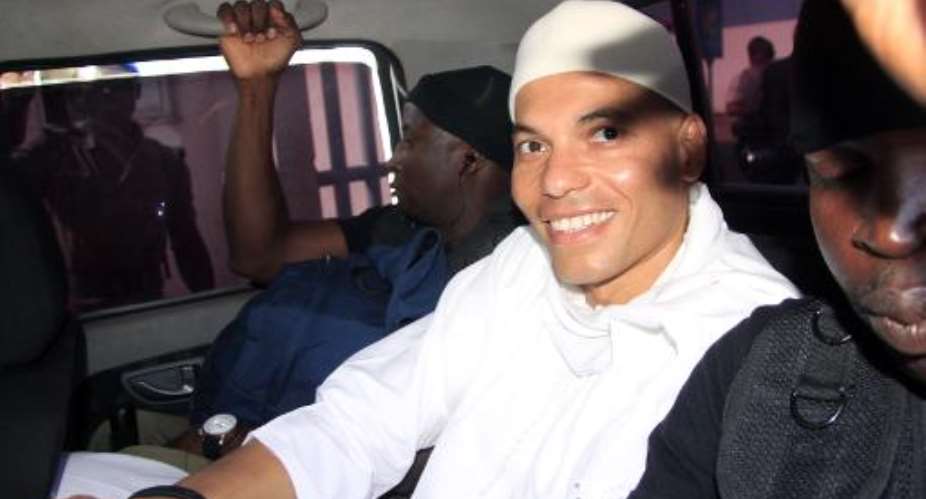 File photo shows Karim Wade, son of Senegal's former President Abdoulaye Wade, arriving at a court in Dakar on July 31, 2014 for the start of his trial for charges of illicit enrichment.  By  AFPFile