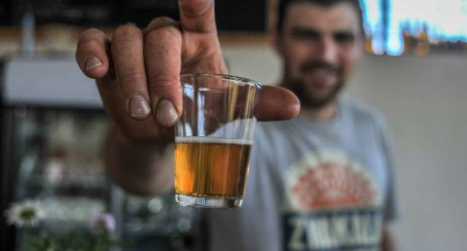 Soon coming to a bar near you: South African craft beer.  By MUJAHID SAFODIEN AFP