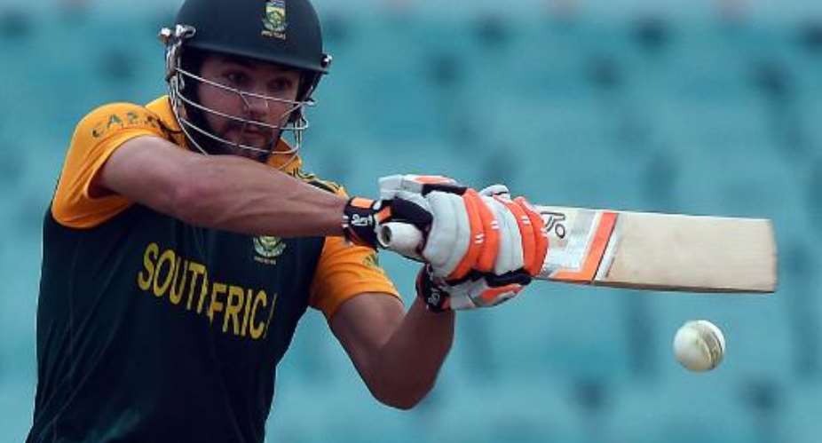Rilee Rossouw plays a shot for South Africa in a one day international against Australia in Sydney on November 23, 2014.  By Saeed Khan AFPFile