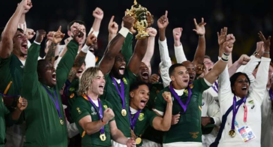 South Africa captain Siya Kolisi lifted the Webb Ellis Cup.  By CHARLY TRIBALLEAU AFP