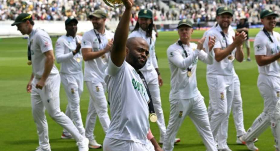 South Africa captain Temba Bavuma shows off the World Test Championship mace after his side beat Australia at Lords in the 2025 final.  By Glyn KIRK (AFP/File)