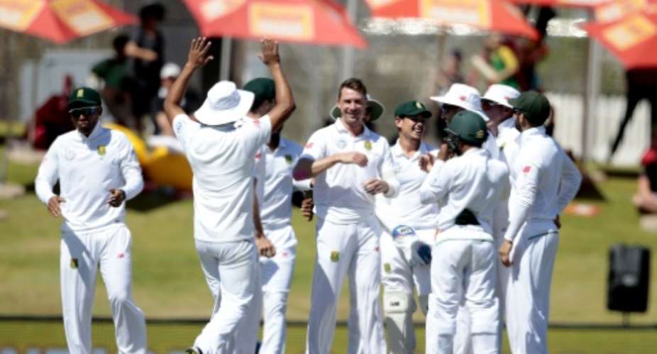 South Africa fast bowler Dale Steyn C celebrates the dismissal of New Zealand batsman Tom Latham on the fourth day of the second Test in Centurion, South Africa on August 30, 2016.  By Gianluigi Guercia AFP