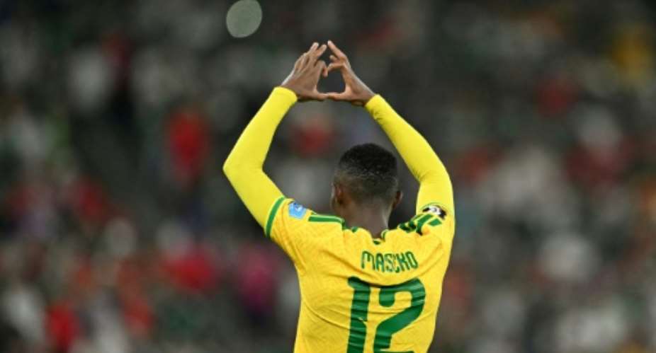 South Africa forward Thapelo Maseko celebrates scoring against South Korea in their World Cup Group A match.  By Yuri CORTEZ (AFP)