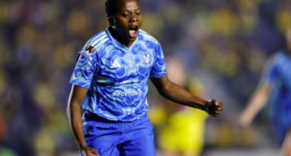 South Africa match-winner Thembi Kgatlana celebrates a goal for her Mexican club Tigres..  By Rodrigo Oropeza (AFP)