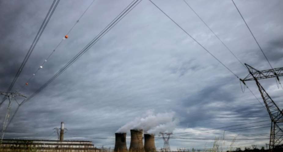 South Africa power utility giant Eskom imposed severe and highly unpopular power rationing, known as load-shedding, for ten consecutive days in March 2019.  By MARCO LONGARI AFPFile