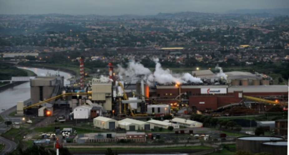 South Africa responds to 'the urgent need for action' with a carbon tax.  By ALEXANDER JOE AFP