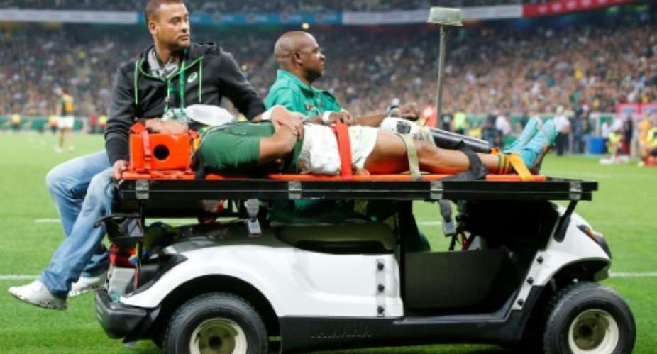 South Africa wing Kurt-Lee Arendse is removed from the field after being injured during a Rugby Championship match against New Zealand in Mbombela on August 6, 2022..  By PHILL MAGAKOE AFP