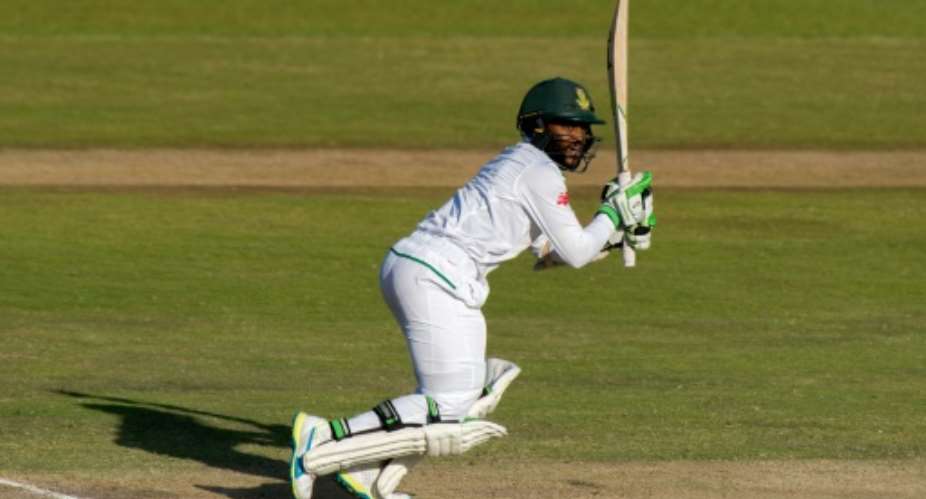 South African batsman Temba Bavuma plays a shot of the second Test Match between South Africa and New Zealand at the Supersport Cricket stadium on August 29, 2016 in Centurion.  By Christian Kotze AFPFile