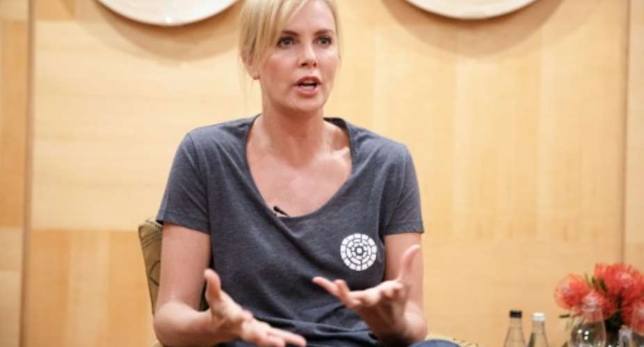 South African born actress and Academy Award winner Charlize Theron supports community-based HIV programmes to stop the spread of AIDS in her home country.  By GIANLUIGI GUERCIA AFP