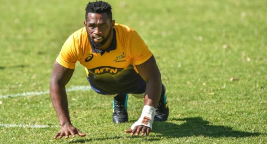 South African flanker Siya Kolisi, the first black Test captain who will lead South Africa in a three-Test series against England in June, attends the first Springboks training session at St Stithies College in Johannesburg in May 2018.  By Christiaan Kotze AFPFile