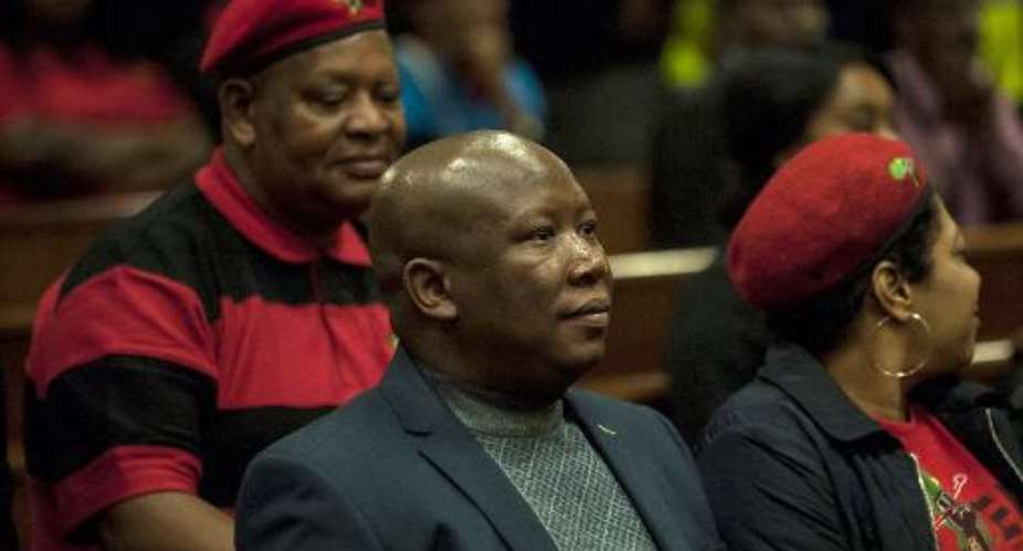 Economic Freedom Fighters leader Julius Malema sits in the Gauteng North High Court in Pretoria on June 1, 2015.  By Stefan Heunis AFP