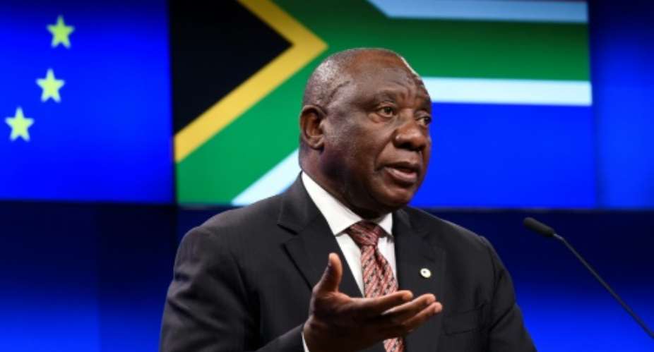South African President Cyril Ramaphosa 'needs to deal with the ghost of Jacob Zuma that is roaming around ANC structures', said political analyst Xolani Dube.  By JOHN THYS AFP