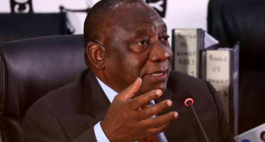 South African President Cyril Ramaphosa pictured August 2021 stressed that an immunised adult population was key to fully reopening the economy and avoiding a fourth Covid-19 infection wave.  By Sumaya HISHAM POOLAFPFile