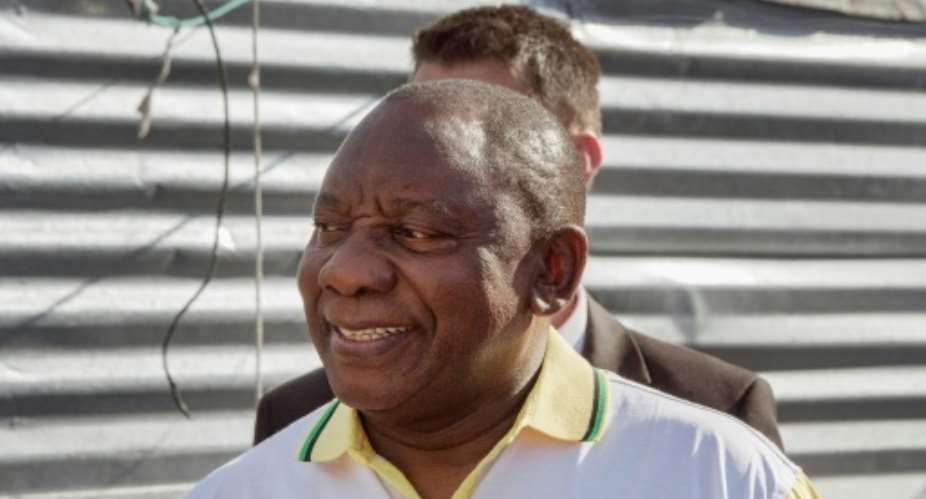 South African President Cyril Ramaphosa smiled and chatted with passengers when he got stuck for hours on a commuter train heading to the capital Pretoria.  By RODGER BOSCH AFP