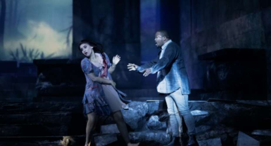 South African singers Brittany Smith (left) and Lukhanyo Moyake rehearse Donizettis Lucia di Lammermoor.  By MARCO LONGARI (AFP)