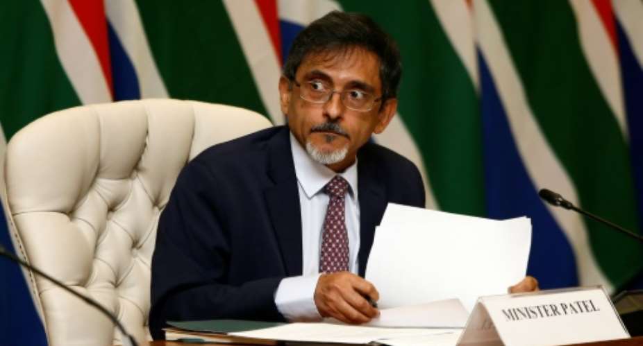South African Trade Minister Ebrahim Patel, pictured in March 2020, is among four ministers and several MPs who have so far contracted coronavirus in South Africa.  By Phill Magakoe POOLAFPFile