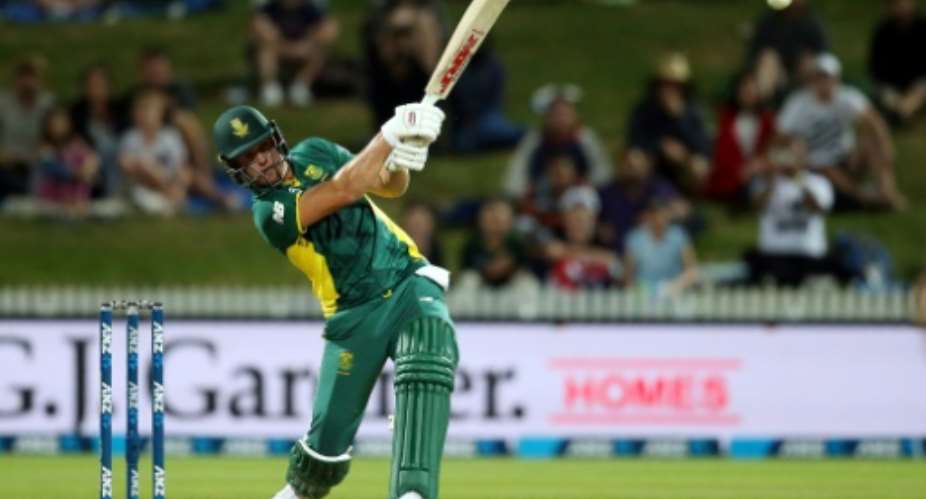 South Africa's AB de Villiers hits the winning runs during the one-day international against New Zealand at Seddon Park in Hamilton, on February 19, 2017.  By MICHAEL BRADLEY AFP