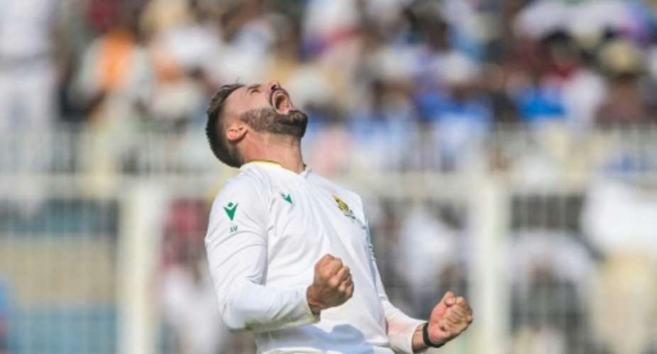 South Africas Aiden Markram celebrates the wicket of Indias Washington Sundar in the first Test.  By DIBYANGSHU SARKAR (AFP)