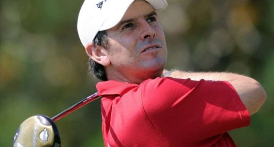 Thomas Aiken tees off on the fifth hole during the Avantha Masters golf tournament in Greater Noida on March 17, 2013.  By Manan Vatsyayana (AFP)