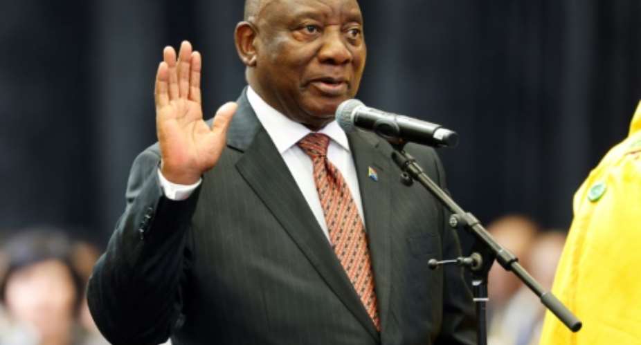 South Africas Cyril Ramaphosa was sworn in as a member of the National Assembly but would have to wait until later Friday to discover whether he would be re-elected president.  By WIKUS DE WET (AFP)