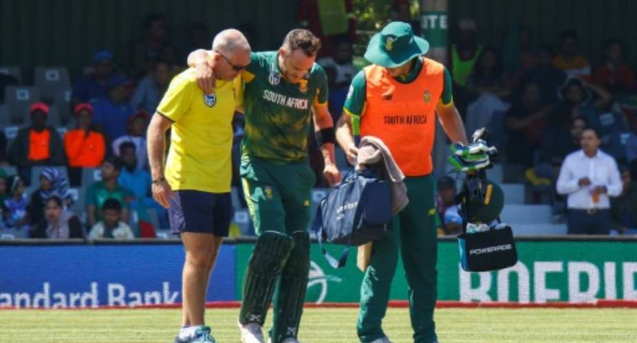 South Africa's Faf du Plessis capt leaves the field after being injured during their one-day international against Bangladesh at the Buffalo Park Cricket Grounds in East London on October 22, 2017.  By Michael SHEEHAN AFP