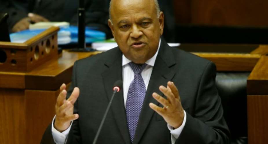 South Africa's Finance Minister Pravin Gordhan delivers his budget address to parliament in Cape Town on February 24, 2016.  By Mike Hutchings PoolAFPFile