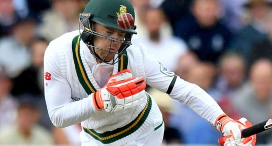South Africa's Heino Kuhn was hit on the helmet by a bouncer from England's Mark Wood on the first day of the second Test at Trent Bridge, on July 14, 2017.  By Anthony Devlin AFP