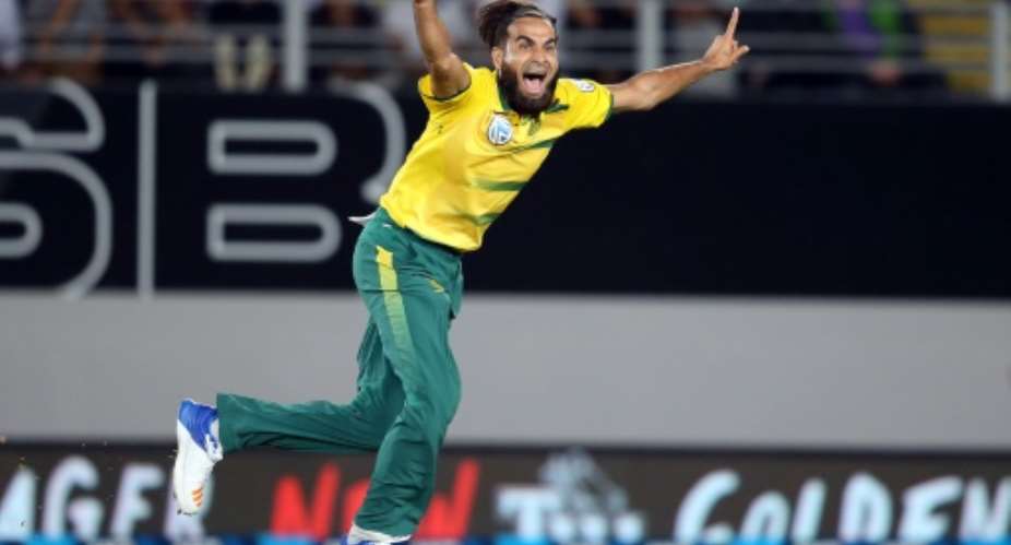 South Africa's Imran Tahir celebrates taking the wicket of New Zealand's Luke Ronchi during the Twenty20 international at Eden Park in Auckland on February 17, 2017.  By Michael BRADLEY AFP
