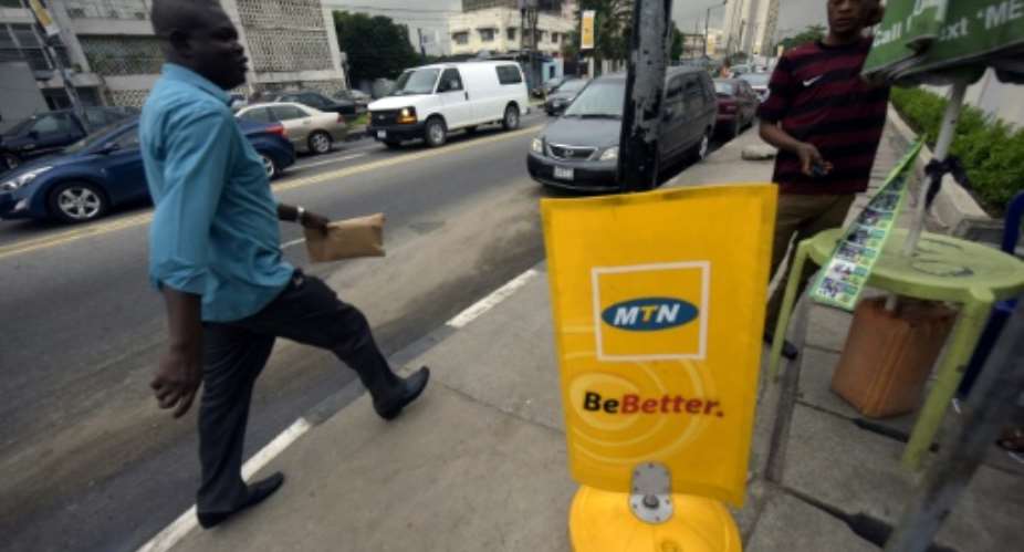 South Africa's telecom giant MTN has operations in different countries including Nigeria, where it was fined in 2015 for missing a deadline to disconnect unregistered SIM cards.  By PIUS UTOMI EKPEI AFPFile
