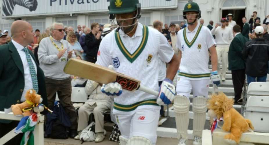 South Africa's Vernon Philander C and Chris Morris leave the pavilion to continue their first innings at the start of play on the second day of their second Test match against England, at Trent Bridge cricket ground in Nottingham, on July 15, 2017.  By Anthony Devlin AFPFile