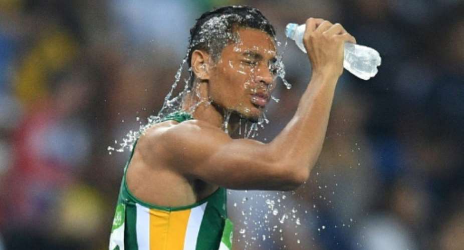 South Africa's Wayde Van Niekerk celebrates winning the mens' 400m event during the Diamond League athletics meeting Athletissima in Lausanne on July 6, 2017.  By Fabrice COFFRINI AFPFile