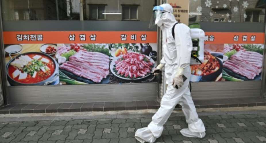 South Korea has announced heightened restrictions to try to control a new outbreak.  By Jung Yeon-je AFPFile